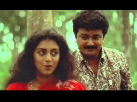Edan Thazhvarayil Lyrics – Kuruppinte Kanakku Pusthakam Malayalam Movie